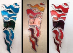 Shaped acrylic clocks in varying colours