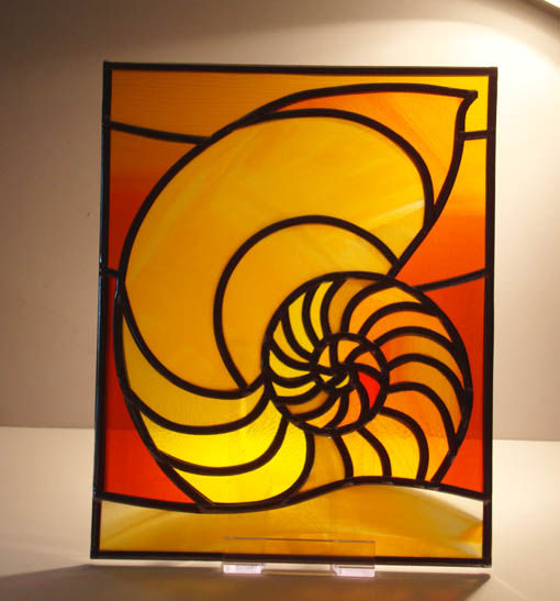 Shell design stained glass panel