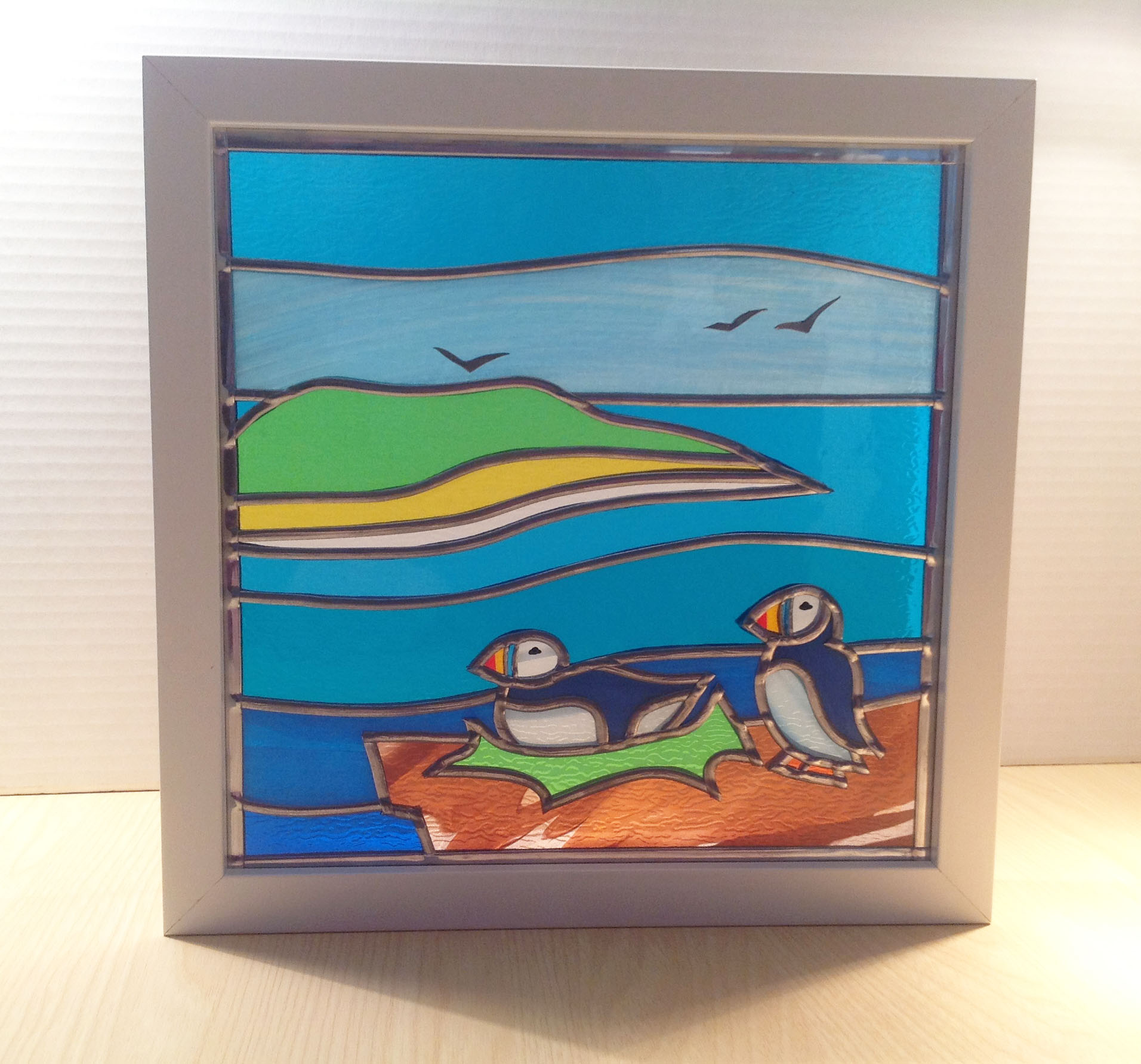 Stained glass puffins